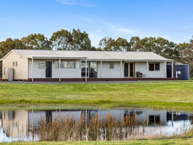 Peaceful Country Living on 23 Acres with Exceptional Shedding