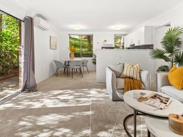 Peaceful Courtyard Apartment with Village Convenience