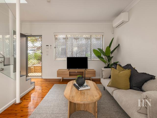 Peaceful dual level retreat in convenient locale