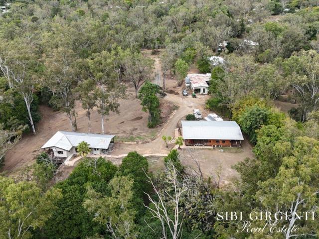 PEACEFUL EMERALD CREEK HIDEAWAY WITH ENDLESS POTENTIAL