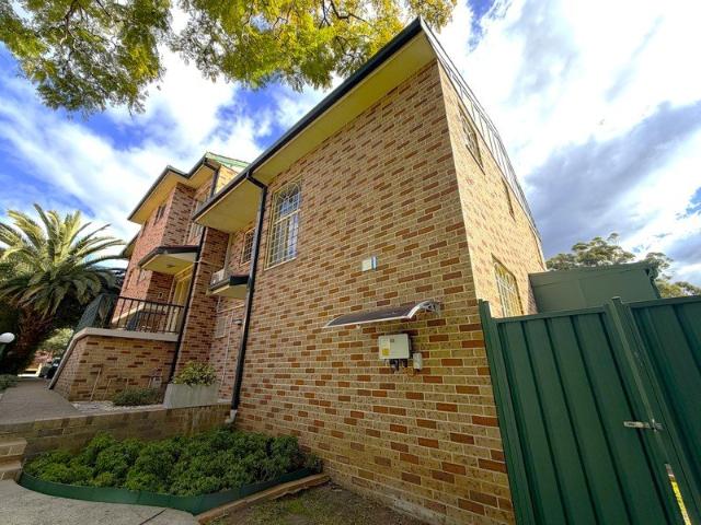 Peaceful Family Living with Parkside Outlook and Sunny Backyard
