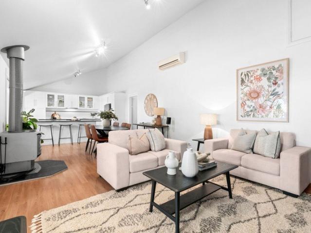 Peaceful home with comfort, entertaining spaces and views