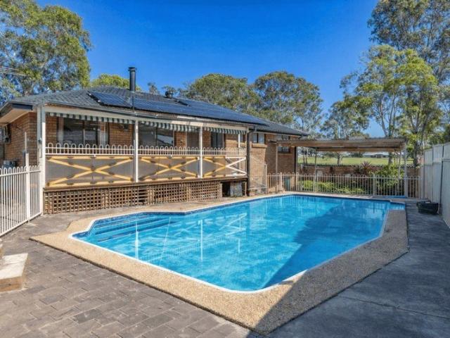 Peaceful Jamisontown Living with In Ground Pool + Solar Panels!