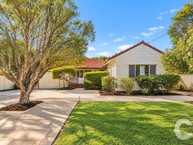 Peaceful Leafy Living with Development Potential!