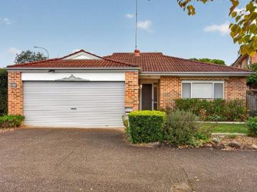Peaceful, Low Maintenance Living in a Highly Sought After Location