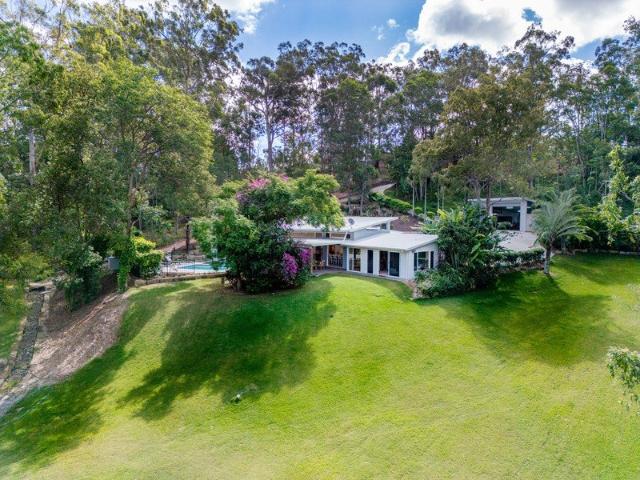 Peaceful, Private, Sanctuary Established on Two Acres in Prime Location!