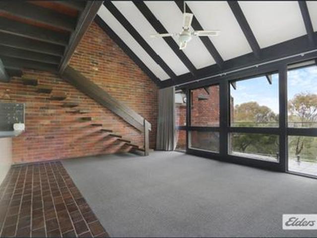 Peaceful Riverside Living in a Prime Location
