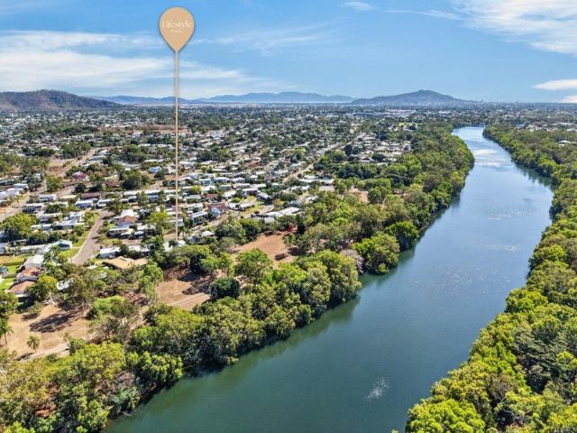 Peaceful Riverside Living Just Minutes from Everything