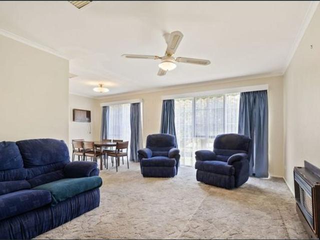 Peacefully positioned right across from Les Stone Park!