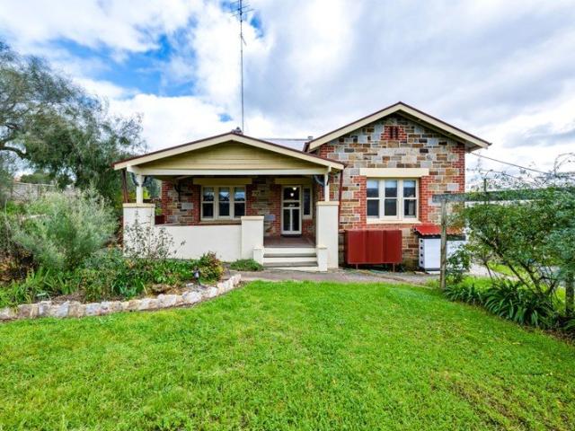 Pebble Stone Character Home Circa 1921 Charming, Private & Packed with Features