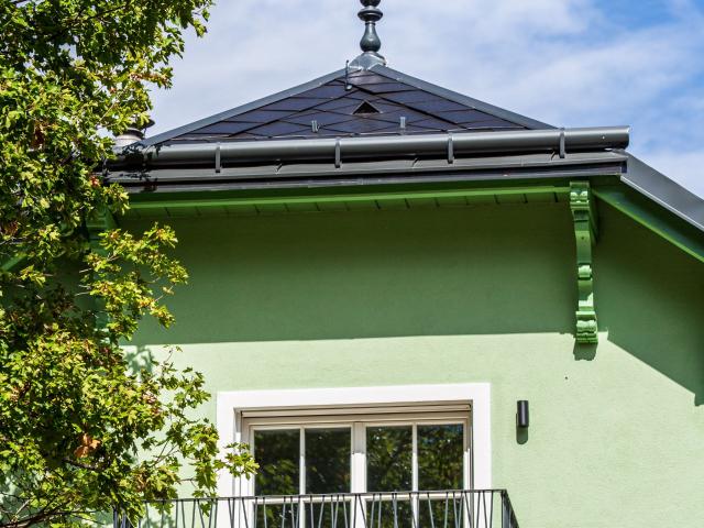Perched above it all 3 rooms under the roof with wonderful garden view