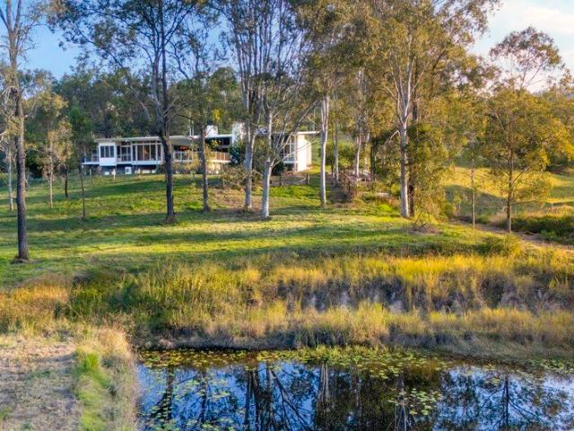 PERFECT BLEND OF CONTEMPORARY DESIGN & RURAL SERENITY ON 5 ACRES