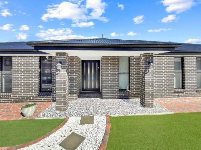 PERFECT FAMILY OASIS WITH SPACIOUS INTERIORS & EXCELLENT RURAL OUTLOOK