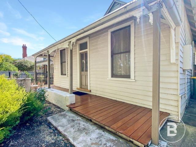 PERFECTLY SITUATED HOME 5 MINUTES FROM C.B.D