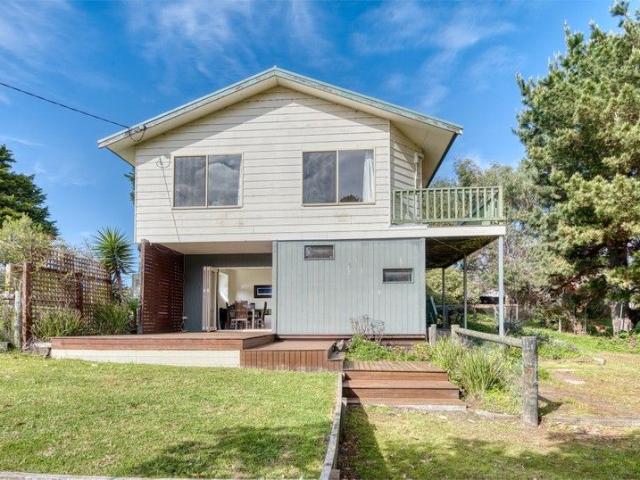 Spacious Coastal Retreat Just Moments from the Beach