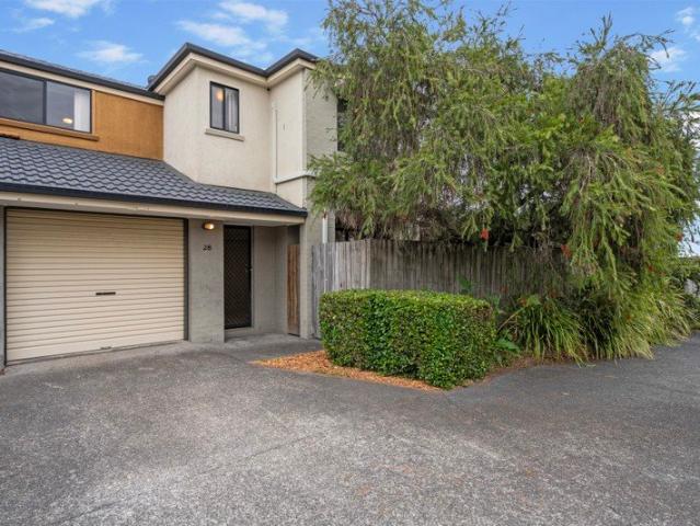 Perfectly Positioned Townhouse in a Gated Complex