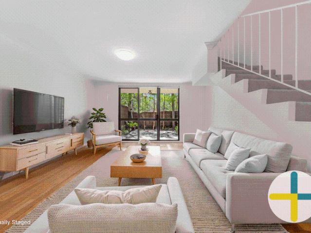 Perfectly Positioned Townhouse with North Easterly Courtyard