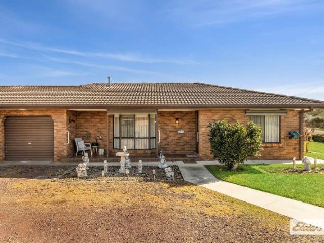 Perfectly Positioned & Beautifully Updated Unit