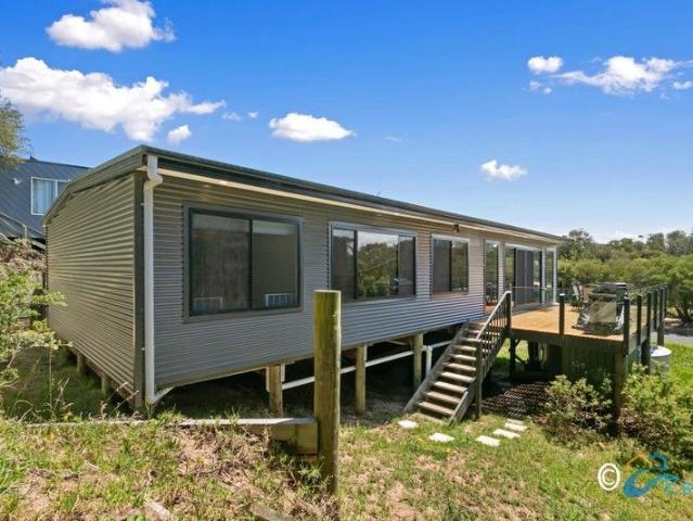 PERFECTLY POSITIONED COASTAL ESCAPE WATER VIEWS, RENOVATED EXTERIOR AND ROOM FOR THE WHOLE FAMILY