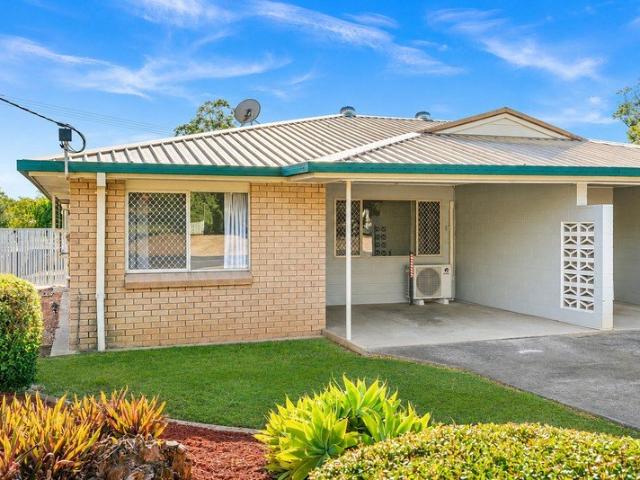 Perfectly Positioned Duplex Overlooking the Golf Course