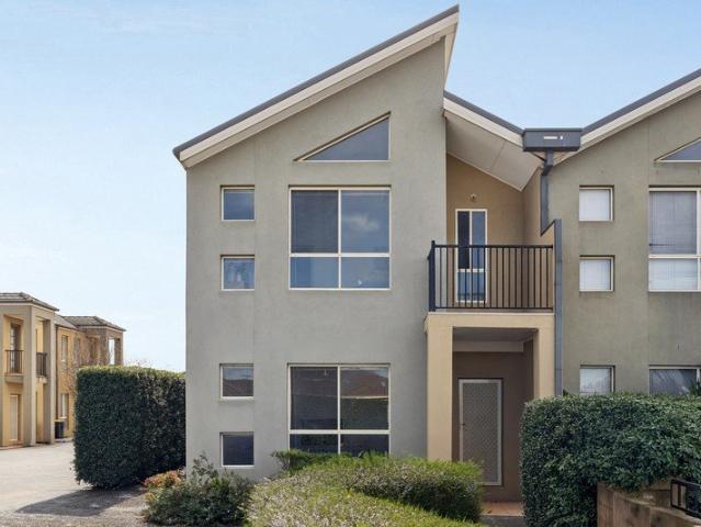 Perfectly Positioned for Low Maintenance Living
