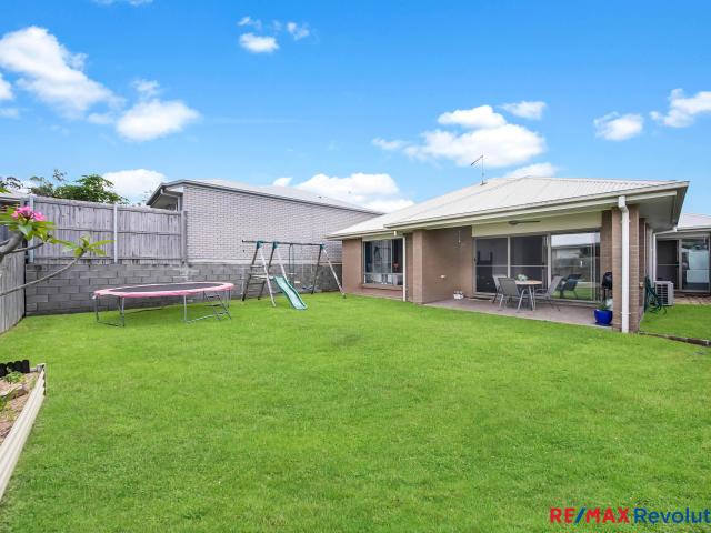 Perfectly Positioned Home Close to Belyando Park and a Great Yard for Entertaining