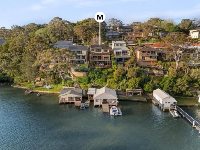 Personality Plus Street to Waterfront Home with Apartment & Boathouse