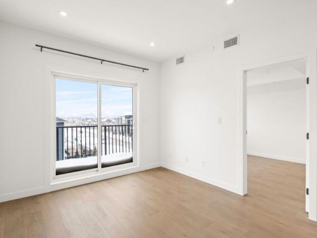 Pine: Black Cabinets – 225 Peguis, Winnipeg, MB