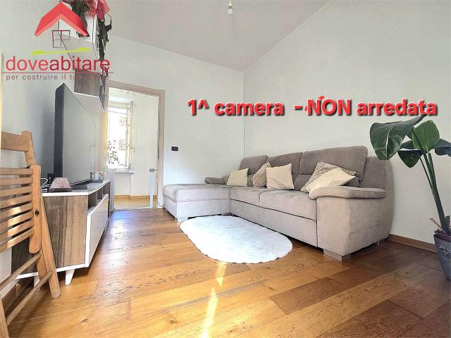PINEROLO centro Ampio TRILOCALE angolare con 2 balconi