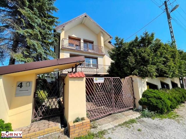 Sprzedam dom z usługami 255 m², ogród, garaż w Piotrkowie