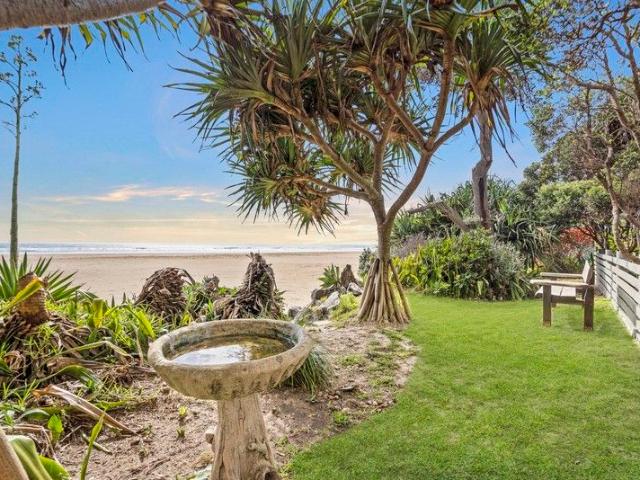 Significant Price Adjustment Rare Absolute Beachfront Opportunity