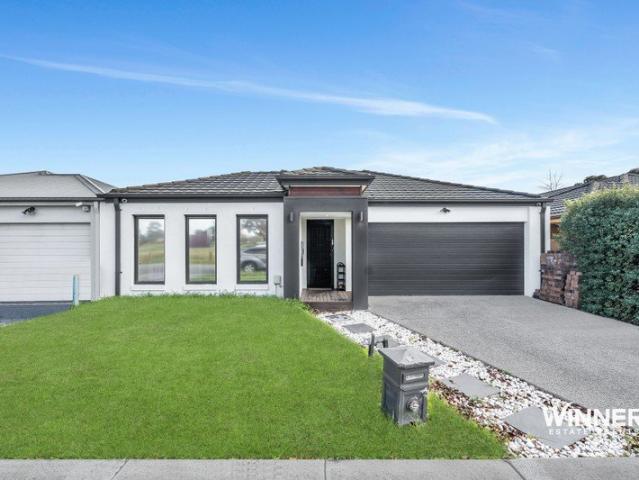 Picture Perfect Living in the Prestigious Quarters Estate!