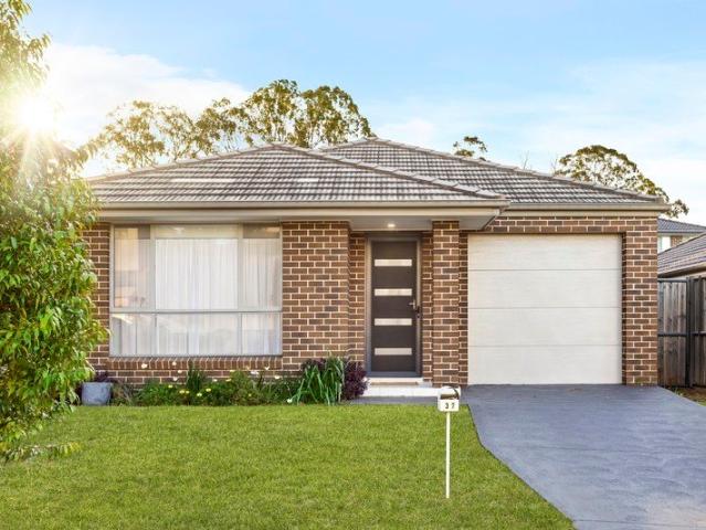 Picture Perfect, Sun Drenched Family Home within short proximity to Multiple Amenities!