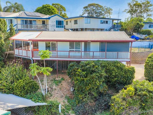 PICTURE PERFECT POSITION… ELEVATED HOME. WITH VIEWS…