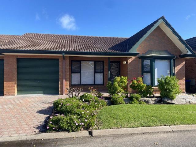 Picturesque two bedroom solid brick unit in an ideal location