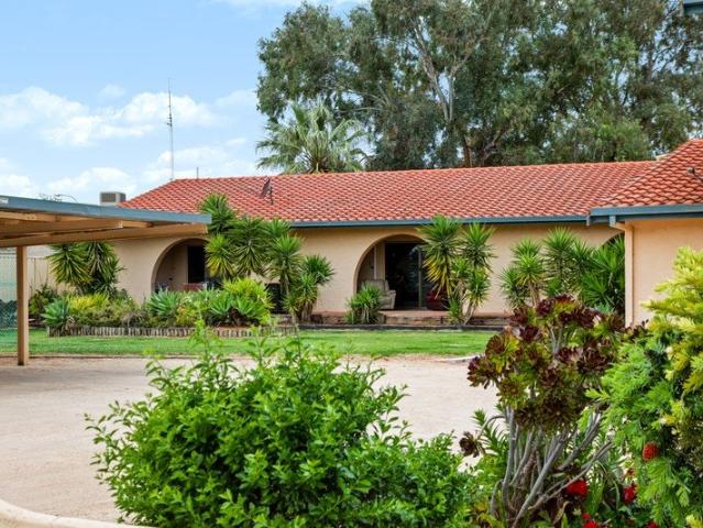 Picturesque Resort Style Living Just Steps from Lake Bonney!