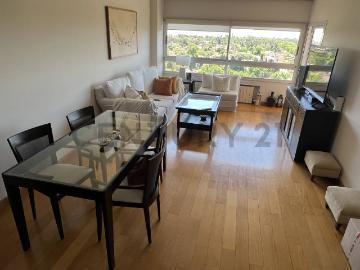 Piso alto con vista al río Exelente distribución