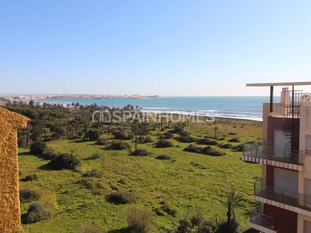 Piso con vistas al mar cerca de la playa en Punta Prima, Alicante