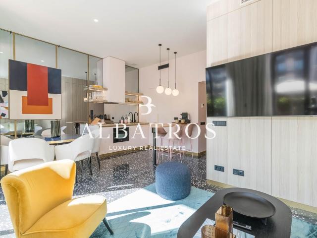 Exclusiva residencia de lujo en Eixample con gran patio privado y piscina comunitaria