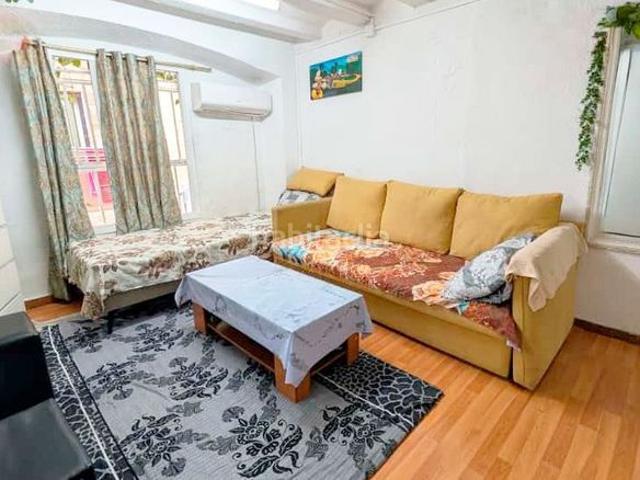 Piso en venta en Barcelona, Raval. Piso reformado con encanto en finca modernista junto al Mercat de Sant Antoni. Pisos.
