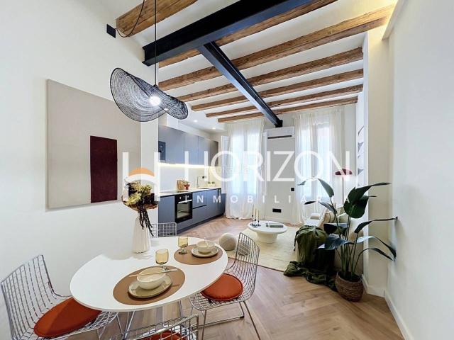 Piso en venta en Barcelona, Sant Antoni. Sartorialidad, historia y luz Residencia de diseño con terraza privada en el corazón de Sant Antoni. Pisos.