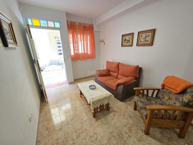 Piso en venta en Castell de Ferro. Vivienda de 3 dormitorios en planta baja a pocos metros de la playa. Pisos Castell de.