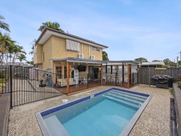 Poolside Living Meets Zero Maintenance Luxury