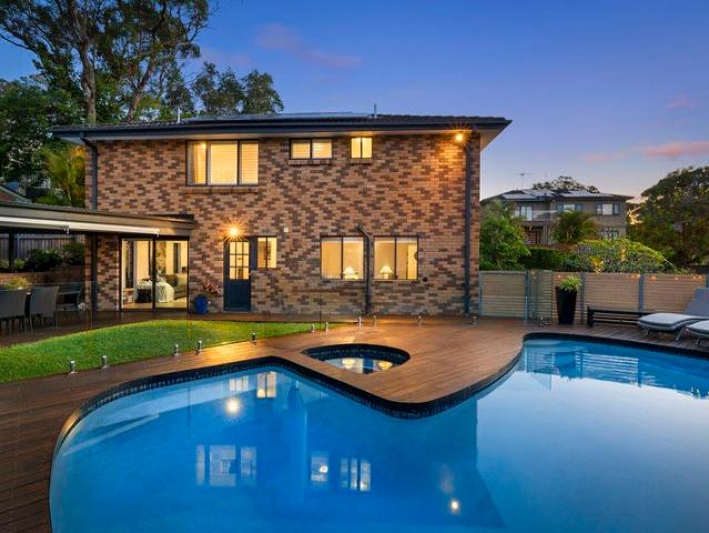 Poolside family living in quiet cul de Sac