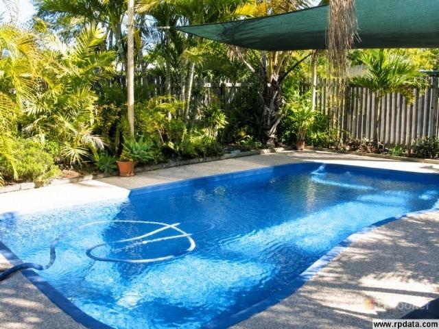 POOLSIDE LIVING IN A SPACIOUS FOUR BEDROOM HOME