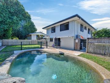 Poolside Living Meets Effortless Family Comfort MOVE IN READY Potential 5.6% Rent Return!
