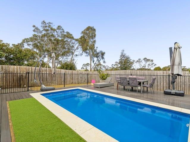POOLSIDE LIVING The Family Home You've Been Waiting For