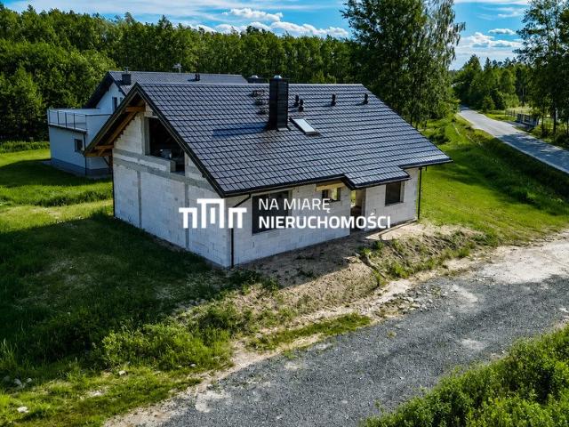 Nowoczesny dom 152 m² w stanie surowym z dużym potencjałem