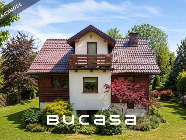 Polecam klimatyczny dom z dużym ogrodem i 12 arową działką