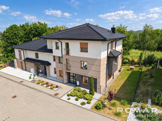 Polecam przestronne 70 m² mieszkanie z balkonem i miejscem parkingowym